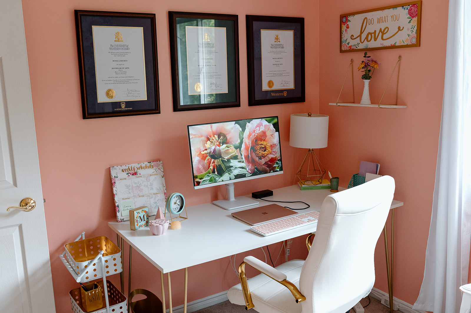 Warm and inviting home office workspace with diplomas and professional setup